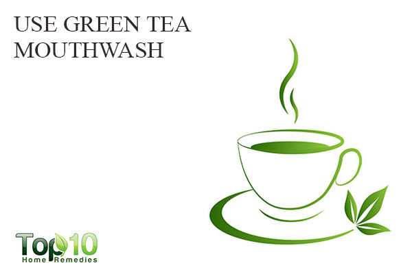 use green tea mouthwash to treat white spots on teeth